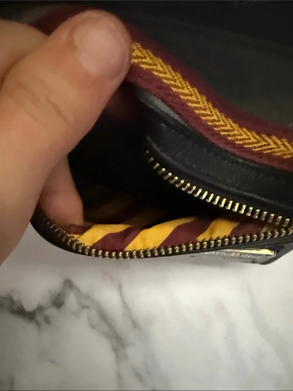 Loungefly Gray Harry Potter Gryffindor Mini Backpack with Red and Gold Accents